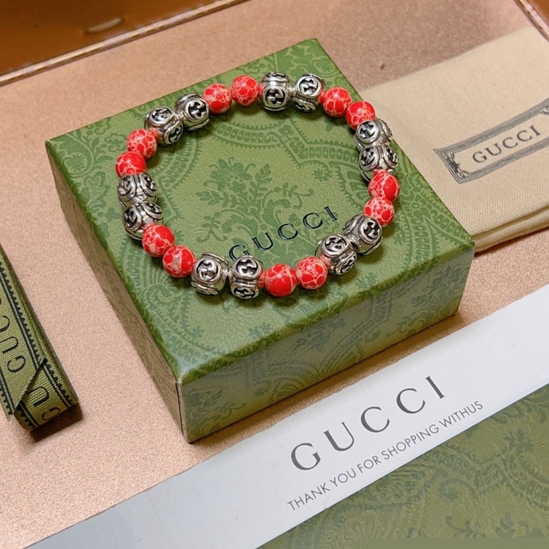 G*u*i bracelets